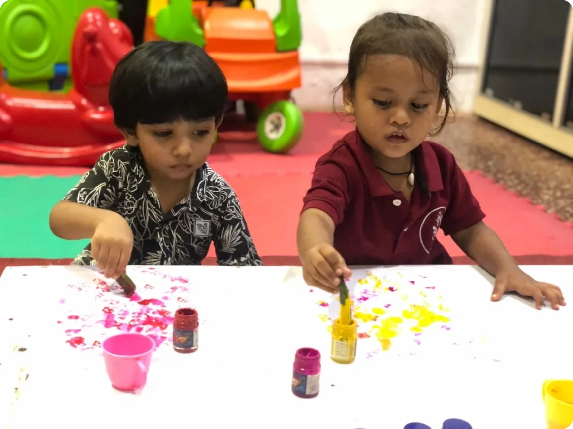 Children painting at Shanti Niketan